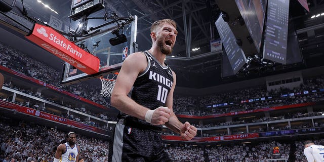 Domantas Sabonis #10 of the Sacramento Kings celebrates a play during Round One Game One of the 2023 NBA Playoffs against the Golden State Warriors on April 15, 2023, at Golden 1 Center in Sacramento, California. 