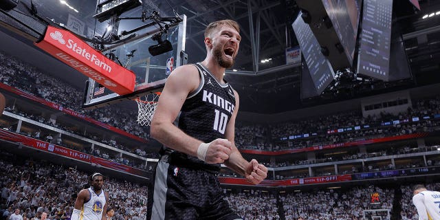 Domantas Sabonis #10 of the Sacramento Kings celebrates a play during Round One Game One of the 2023 NBA Playoffs against the Golden State Warriors on April 15, 2023, at Golden 1 Center in Sacramento, California. 