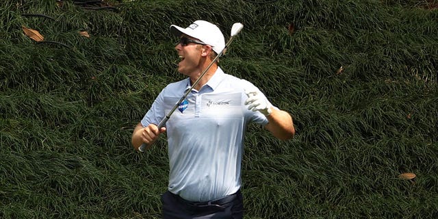 Seamus Power celebrates a hole-in-one on the ninth hole during the Par 3 contest prior to the Masters Tournament at Augusta National Golf Club on April 5, 2023, in Georgia.