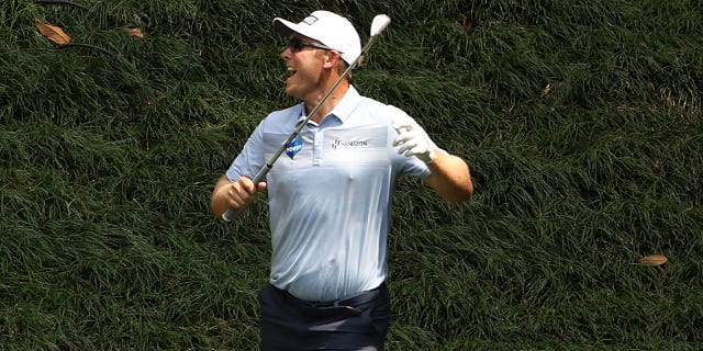 Seamus Power celebrates a hole-in-one on the ninth hole during the Par 3 contest prior to the Masters Tournament at Augusta National Golf Club on April 5, 2023, in Georgia.