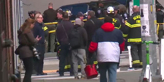 People gather around scene of reported explosion in downtown Seattle