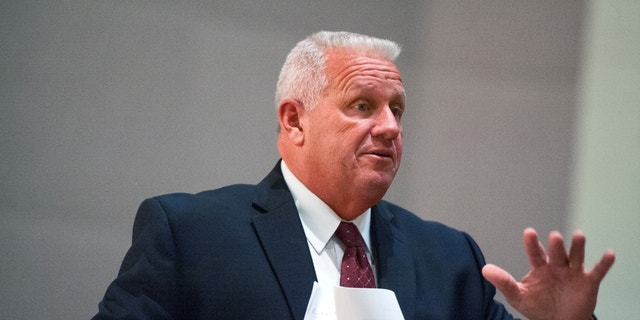 Frederick County Sheriff Charles Jenkins addresses a crowd at Urbana High School about the heroin problem in the county Oct. 21, 2014, in Frederick, Md. 