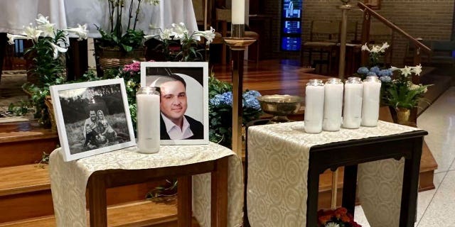 A memorial for Joshua Barrick is on display, late Monday, April 10, 2023, at Holy Trinity Catholic Church in Louisville, Kentucky.