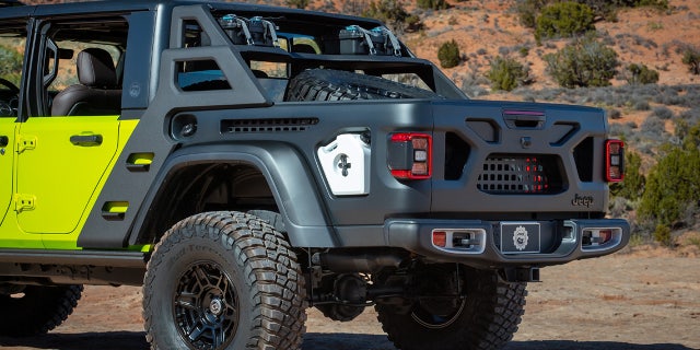 The bed sides incorporate Molle attachments.