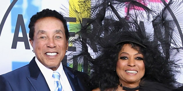 Smokey Robinson at an event with Diana Ross