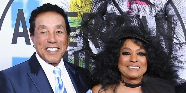 Smokey Robinson at an event with Diana Ross