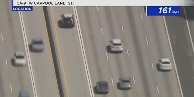 Helicopter footage showing the stolen police cruiser driving at 161 mph.