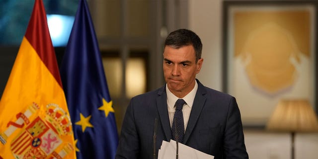 Spain's Prime Minister Pedro Sánchez speaks during a news conference at the Spanish embassy in Beijing March 31, 2023. Sánchez apologized over a law that allows convicted sex offenders to reduce their sentences.