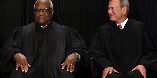 Democrats have requested that Supreme Court Chief Justice John Roberts (right) open an investigation into previously undisclosed trips Associate Justice Clarence Thomas accepted from his friend, billionaire GOP megadonor Harlan Crow.