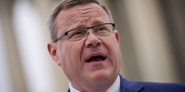 Speaker of the North Carolina House of Representatives Tim Moore talks to reporters outside the U.S. Supreme Court on Dec. 7, 2022, in Washington, DC. Moore visited Ukraine during the legislative break to observe the country during its war against Russia.