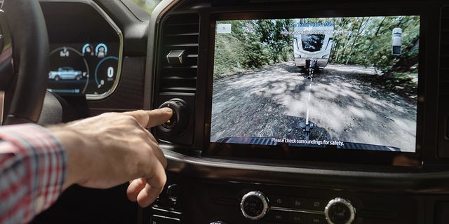 Pro Trailer Hitch Assist is incorporated into the same dashboard controller as the Pro Trailer Backup Assist feature.