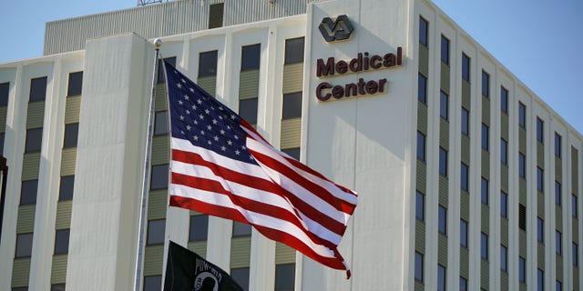 US flag flies in front of VA medical center