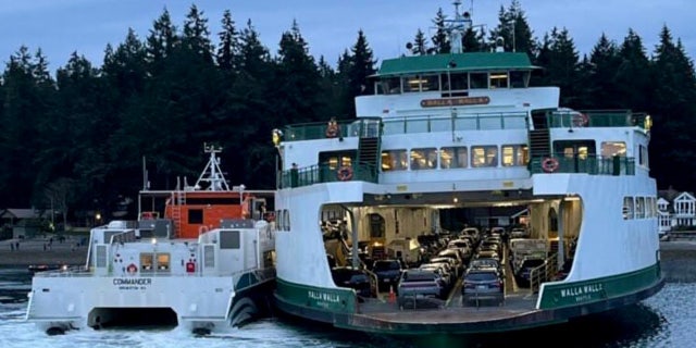 vessel next to stranded ferry