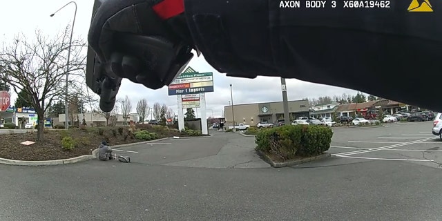 The suspect eventually sat down and gave up after getting hit with multiple beanbag rounds, according to authorities.