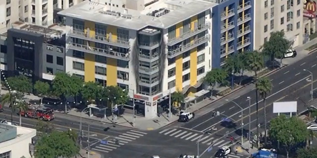 There was a heavy police presence outside the Dylan Apartments off the intersection of Santa Monica Boulevard and La Brea Avenue.