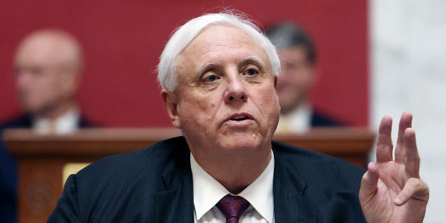 West Virginia Gov. Jim Justice delivers an address in Charleston on Jan. 11, 2023. A federal appeals panel affirmed $2.5 million in penalties against several coal mines owned by Justice on Tuesday.