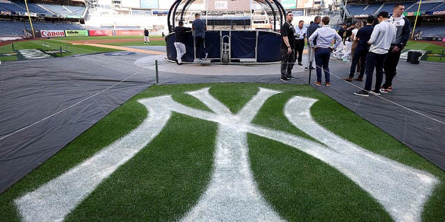 The team logo behind home plate at Yankee Stadium on Oct. 11, 2022, in New York.