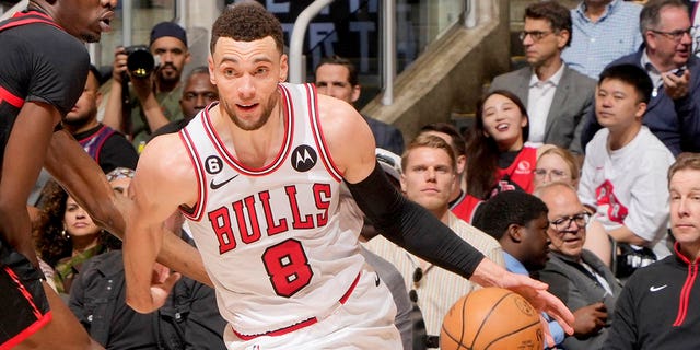 Zach LaVine of the Chicago Bulls drives against the Toronto Raptors during the 2023 play-in tournament April 12, 2023, at the Scotiabank Arena in Toronto.  