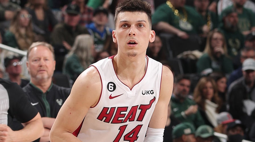 Heat's Tyler Herro breaks hand diving for loose ball, still manages to put up shot