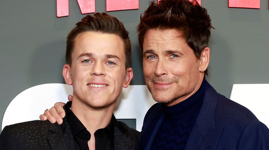 Rob Lowe and son John Owen walk the carpet at the premiere of Netflix’s ‘Unstable’