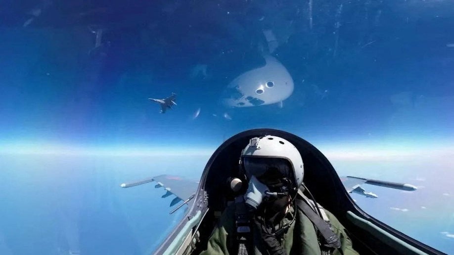 Chinese pilot in flight