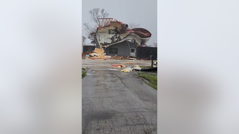 A view of damage to a Colona, Illinois, building caused by a tornado