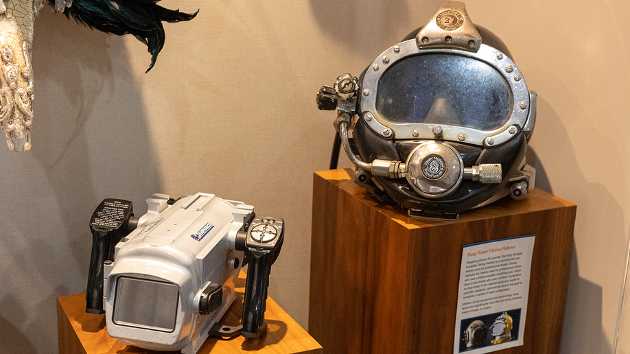 Deepwater helmet and robot on display at Unclaimed Baggage Museum.