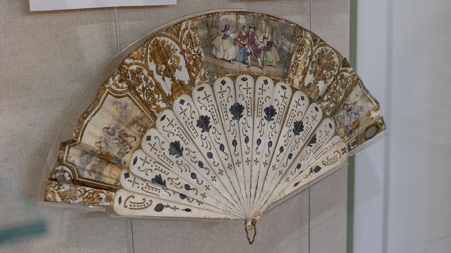 A Victorian-era hand fan on display at Unclaimed Baggage Museum.