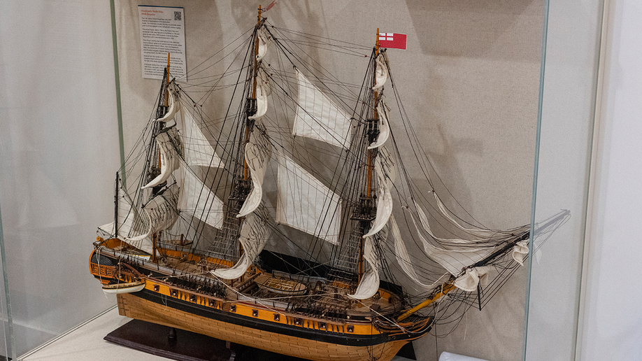 A model wooden ship on display at Unclaimed Baggage Museum.
