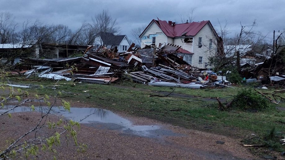 Debris next to houses in Missouri
