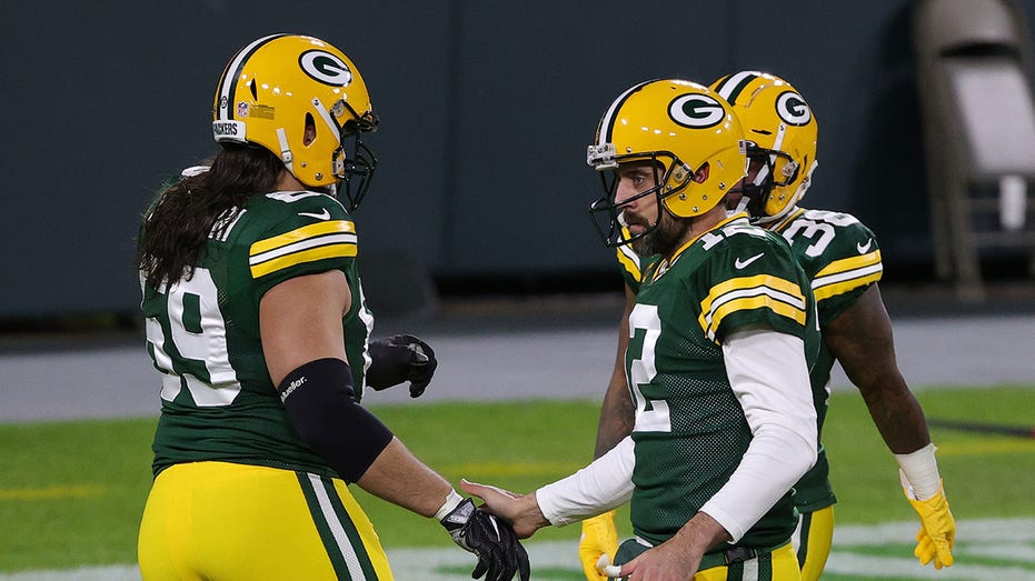 Quarterback Aaron Rodgers says closeted gay players in the NFL are worried  about job security