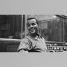 Harry Belafonte posing for the camera and looking over his shoulder