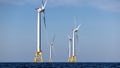 AT SEA - JULY 07: Wind turbines generate electricity at the Block Island Wind Farm on July 07, 2022 near Block Island, Rhode Island. The first commercial offshore wind farm in the United States is located 3.8 miles from Block Island, Rhode Island in the Atlantic Ocean. The five-turbine, 30 MW project was developed by Deepwater Wind and began operations in December, 2016 at a cost of nearly $300 million. (Photo by John Moore/Getty Images)