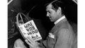 Actor Clark Gable, who played Rhett Butler in the 1939 film "Gone with the Wind," reads a copy of the novel by Margaret Mitchell on which the film was based.