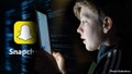 A 12-year-old boy looks at a iPad screen on April 19, 2023 in Bath, England. The amount of time children spend on screens each day rocketed during the Covid pandemic by more than 50 per cent.