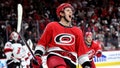 Jesperi Kotkaniemi #82 of the Carolina Hurricanes reacts after scoring his second goal of the second period against the New Jersey Devils in Game Two of the Second Round of the 2023 Stanley Cup Playoffs at PNC Arena on May 05, 2023 in Raleigh, North Carolina.