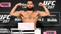 Jorge Masvidal poses on the scale during the UFC 287 official weigh-in at the Hilton Downtown Miami hotel on April 07, 2023 in Miami, Florida.