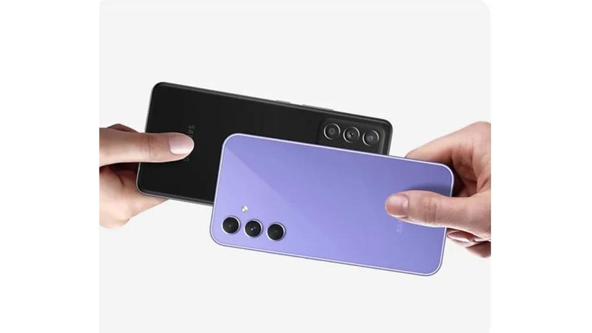 Two Samsung Galaxies, one in black and the other in purple.