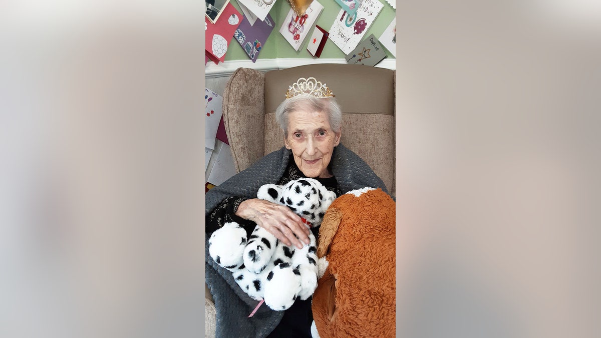 Elderly woman stuffed animal