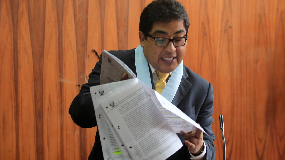 Lawyer of Stephany Flores' family speaks during an audience at the prosecutor's headquarters in Lima