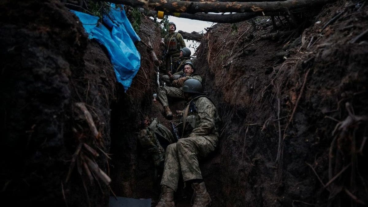 Ukrainian soldiers in trench near Bakhmut