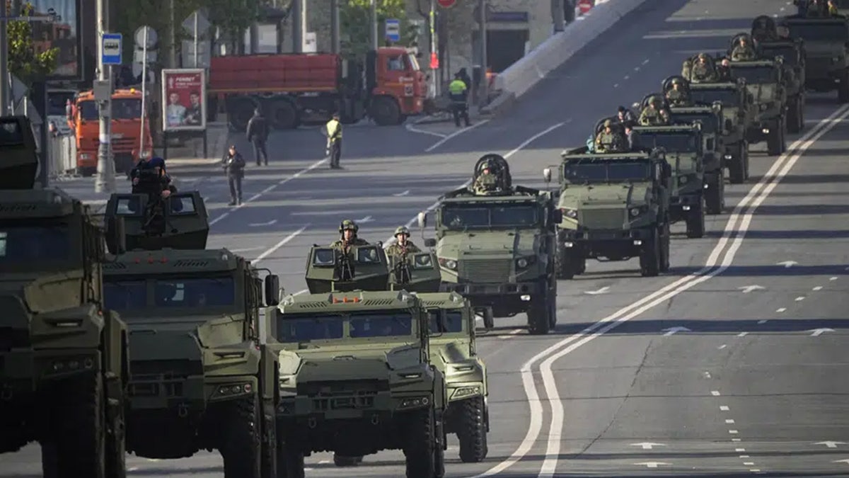 Russian troops driving tanks