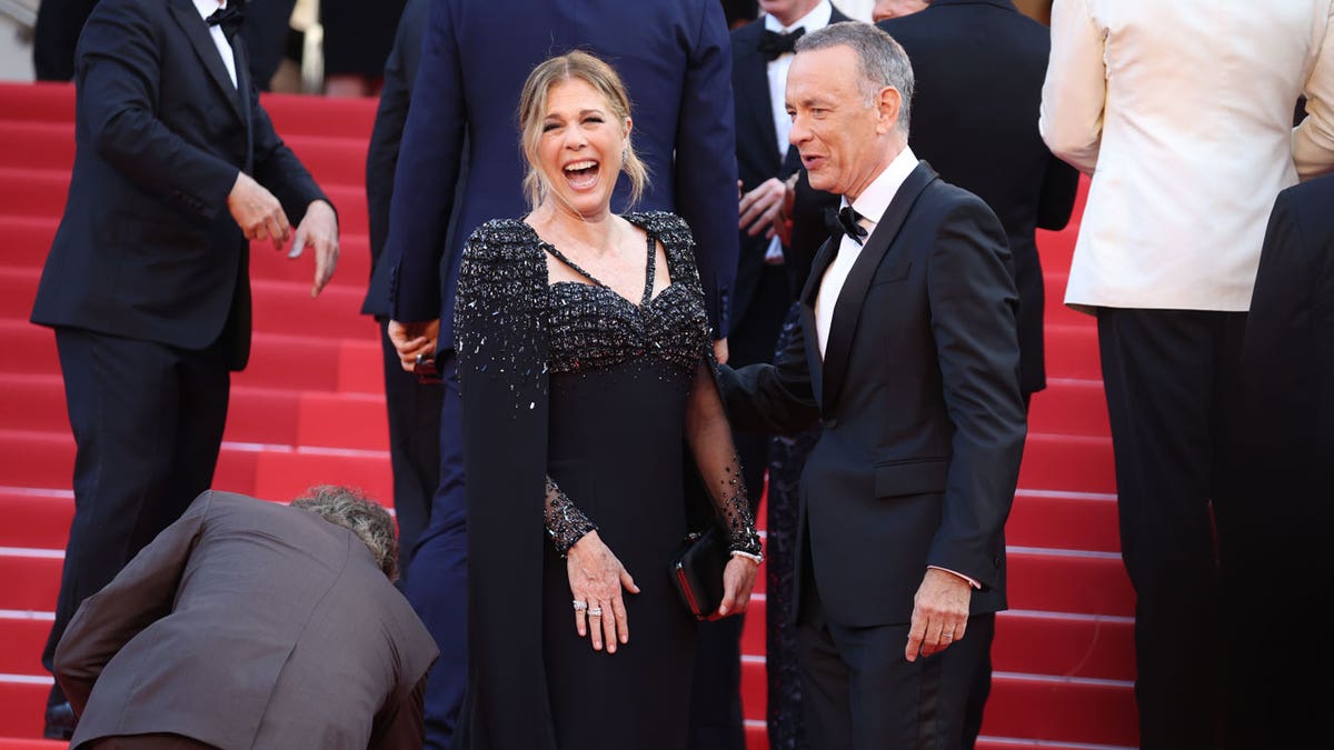 Rita Wilson laughs on red carpet with Tom Hanks