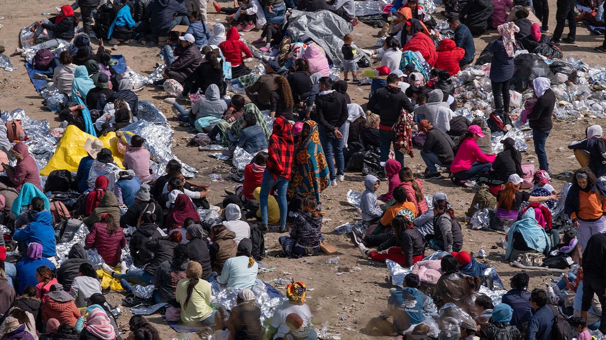 People sitting at the border