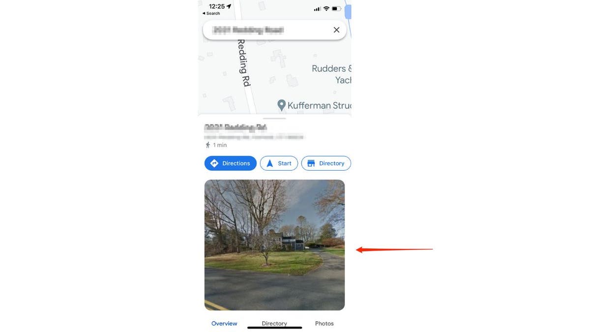 Image of a house and street with red arrow pointing to it on Google Maps