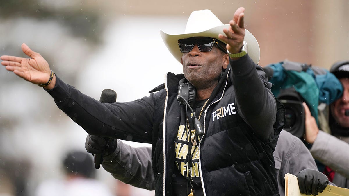 Deion Sanders coaches during the Spring Game