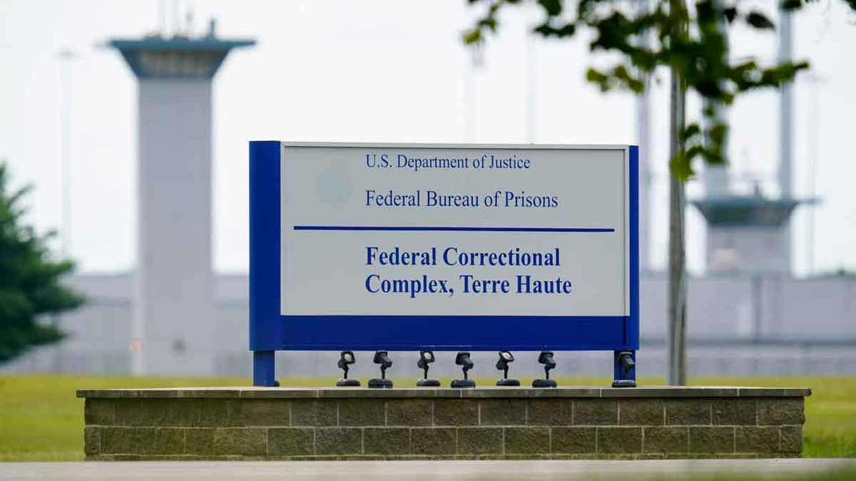  A sign is displayed at the federal prison complex