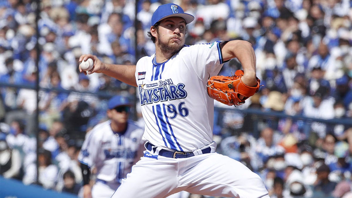 Trevor Bauer pitches for the Yokohama DeNA Baystars