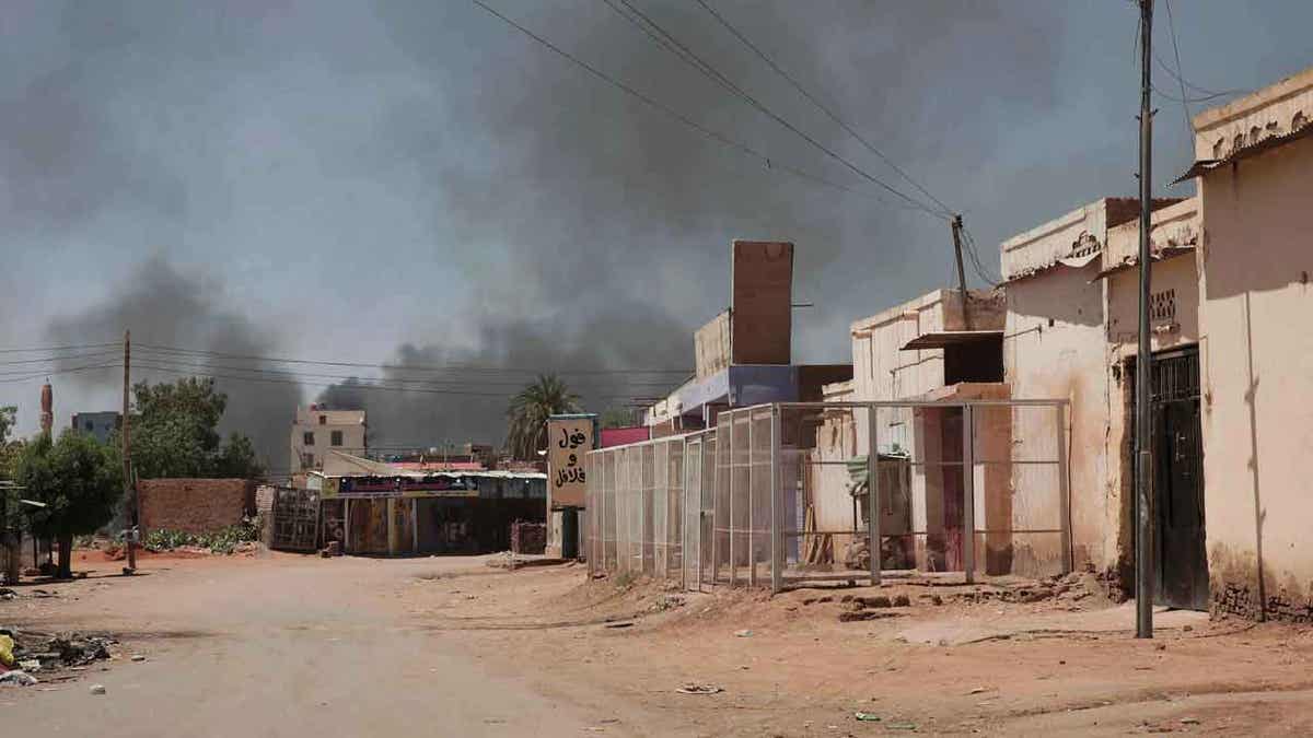 Smoke rises in Khartoum