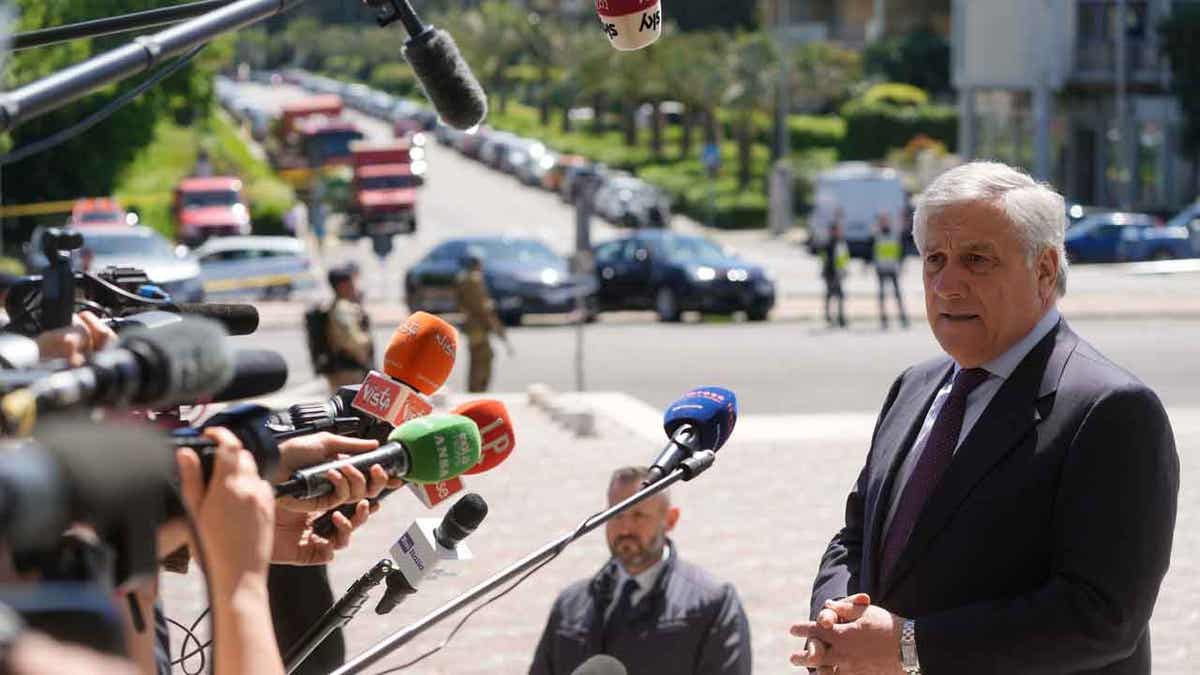 Italian Foreign Affairs Minister Antonio Tajani speaks to reporters in Rome on April 26, 2023. Tajani on May 4, 2023, canceled a trip to Paris over remarks by the French interior minister criticizing the Italian premier’s migration policy.